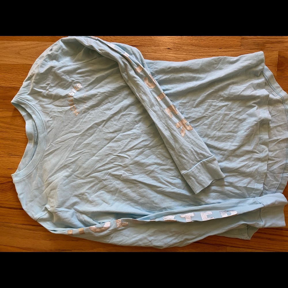Light blue Hollister tee with silver letters
